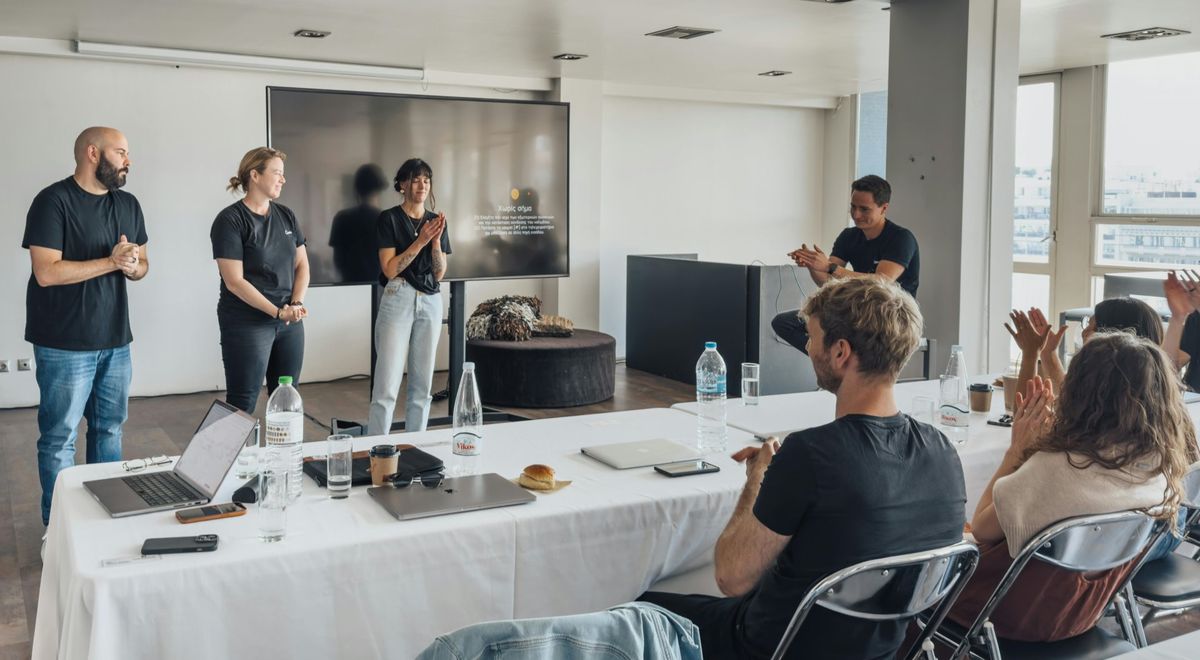 Consultant presenting strategy on a whiteboard